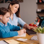 Amakids.bg-MentalnaAritmetika-AnglijskiEzik-GooglePlay-AppStore-preteen-boy-uses-laptop-make-video-call-with-his-teacher-his-mother